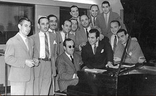 Carlos Di Sarli (seated) and his orchestra